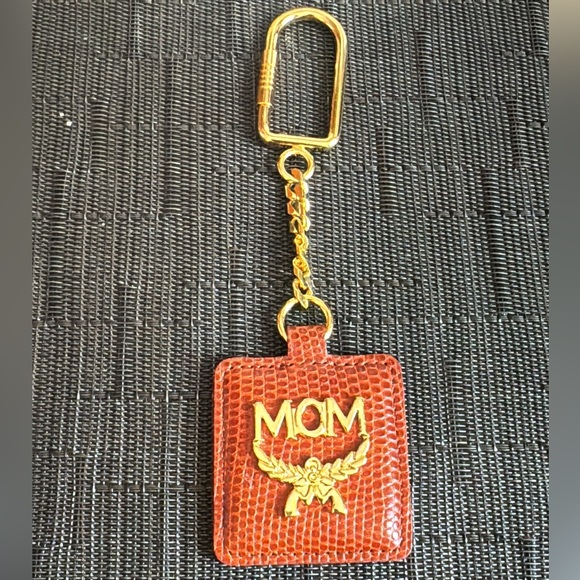 MCM Accessories - 🎁Giftable!🎁 NIB MCM Cognac Pebbled Leather Keychain/Bag Charm - Unisex!